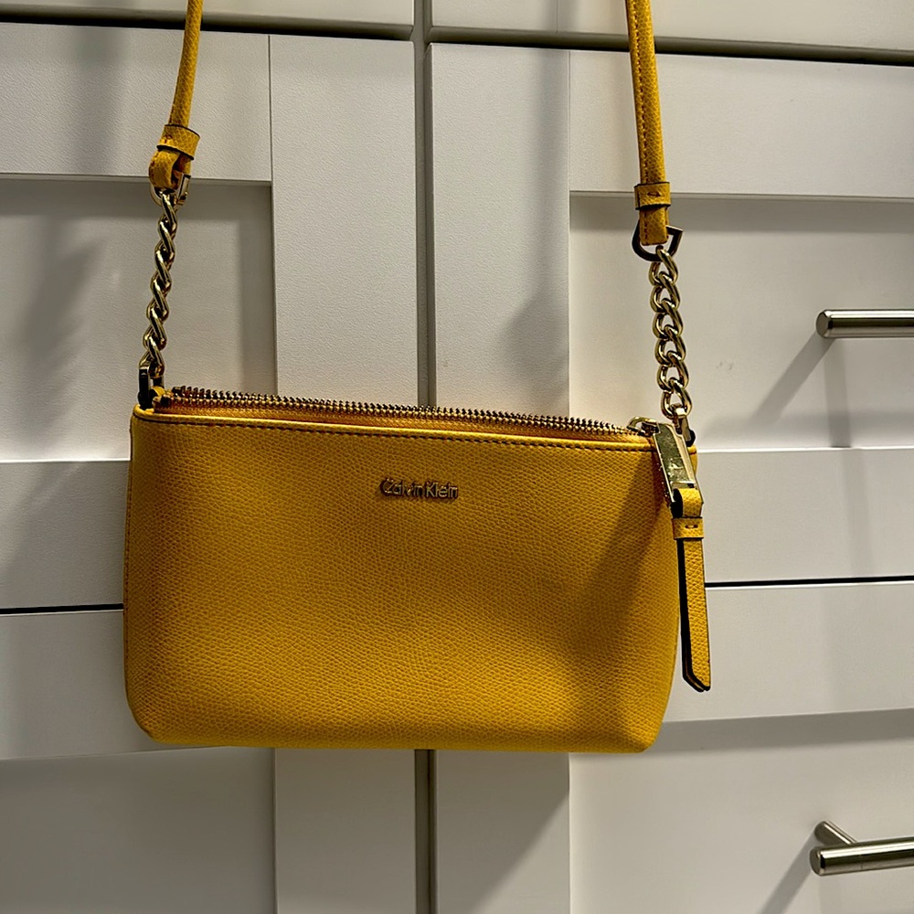 Like new gold Calvin Klein crossbody purse
